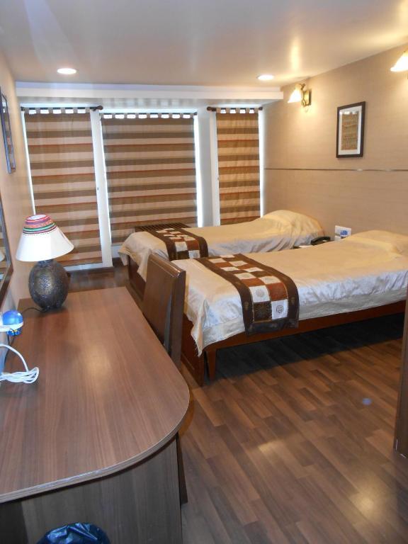 บรันตันไฮจท์เอ็คเซคคิวทีฟสวีทส์ Aparthotel บังกาลอร์ ห้อง รูปภาพ