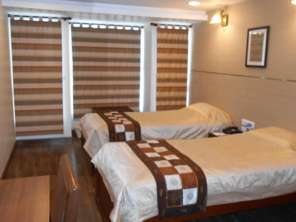 บรันตันไฮจท์เอ็คเซคคิวทีฟสวีทส์ Aparthotel บังกาลอร์ ห้อง รูปภาพ
