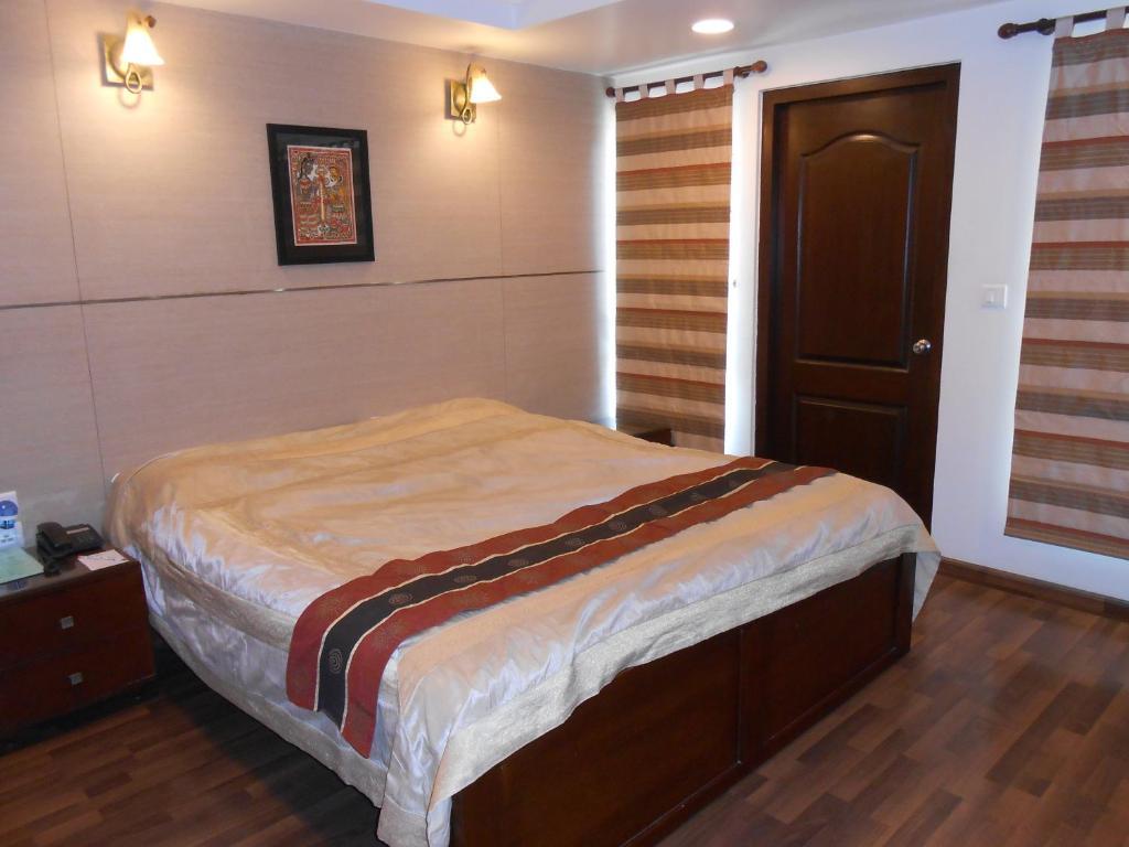 บรันตันไฮจท์เอ็คเซคคิวทีฟสวีทส์ Aparthotel บังกาลอร์ ห้อง รูปภาพ